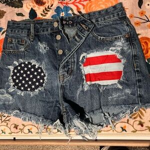Bailey Ray & Co. Distressed Denim Shorts with American Flag Patches